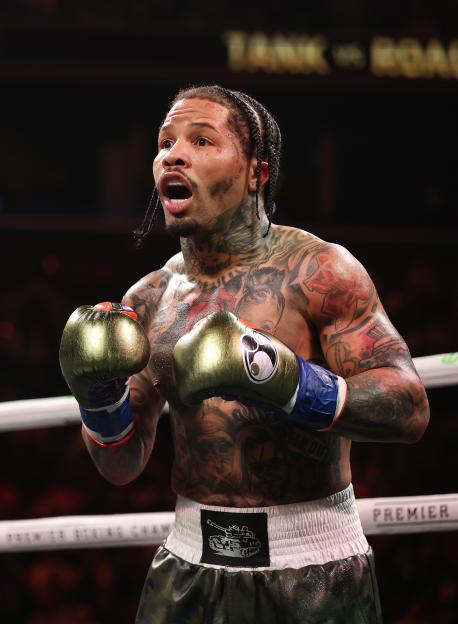 Gervonta Davis in action against Lamont Roach Jr. for Davis' WBA lightweight title.