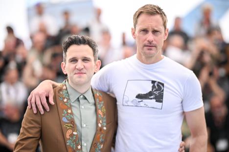 Harry Melling and Alexander SkarsgÃ¥rd at a photocall.