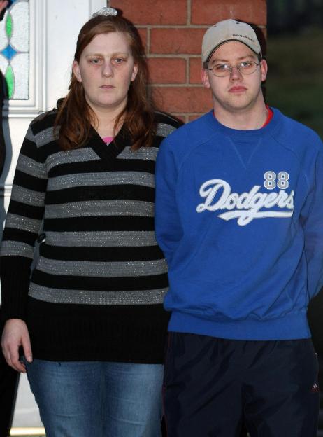 Karen Matthews and Craig Meehan outside their home in Dewsbury, West Yorkshire, nine years ago