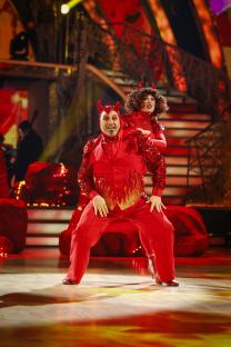 Katya Jones and Wynne Evans in devil costumes dancing on Strictly Come Dancing.