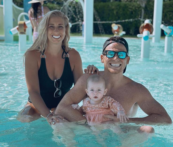 Family in a pool.