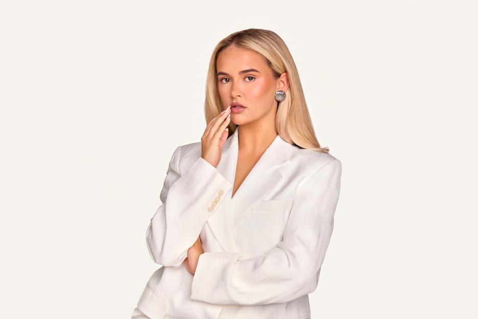 Molly-Mae Hague in a white blazer.