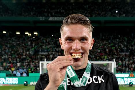 Mandatory Credit: Photo by Valter Gouveia/NurPhoto/Shutterstock (15307427bp) Viktor Gyokeres, forward of Sporting CP, celebrates with the trophy after winning during the Liga Portugal Betclic match between Sporting CP and Vitoria SC at Estadio Jose de Alvalade in Lisbon, Portugal, on May 17, 2025. Sporting CP v Vitoria Guimaraes - Liga Portugal Betclic 2024/2025, Lisbon - 18 May 2025