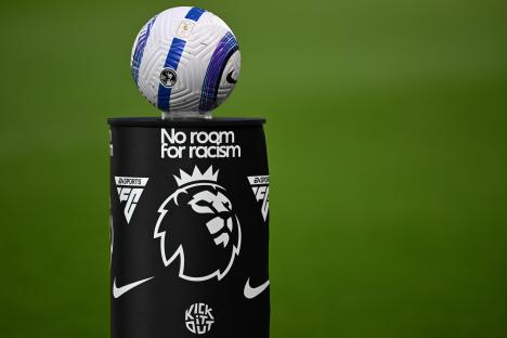 Soccer ball on a "No room for racism" plinth.