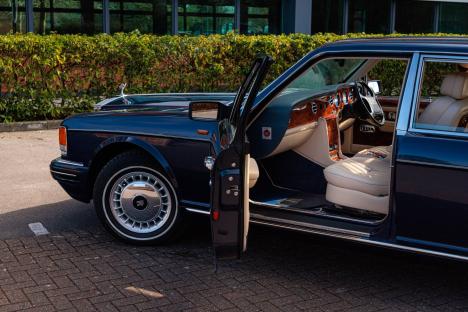 1997 Rolls-Royce Silver Dawn with open door, showing interior.
