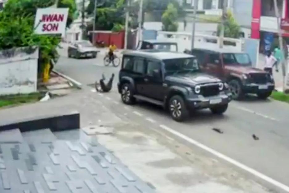 Horrifying moment ‘rich kid’ driver knocks over scooter rider & then reverses 4×4 truck into him in road rage