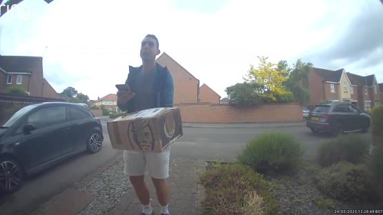 A man delivering a package.