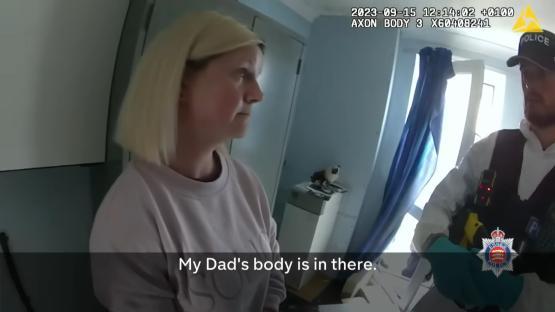 Bodycam footage of a woman confessing to police that her father's body is in the house.