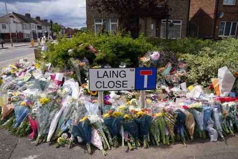 Floral tributes at Laing Close, following a fatal stabbing.