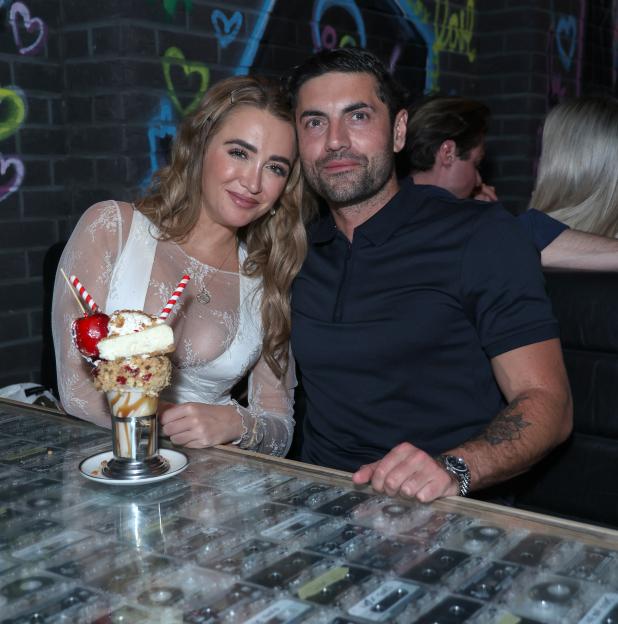 Georgia Harrison and Jack Stacey attending the Black Tap UK party.