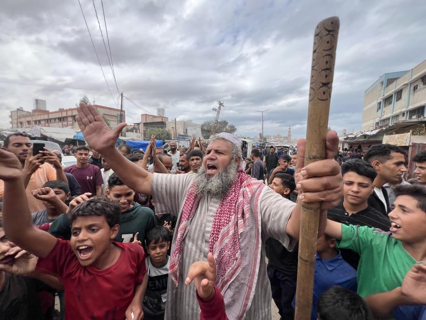 Palestinians celebrating a ceasefire in Khan Yunis, Gaza.