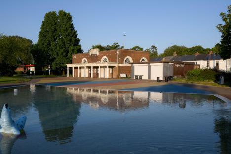 The Junction at Blackpill, a former Mumbles Railway station, reflecting in a pool of water.