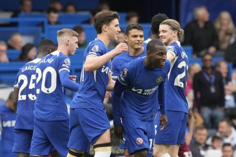Chelsea soccer players celebrating a goal.