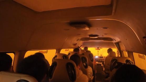 Tourists in a van during a severe sandstorm in Dunhuang, China.