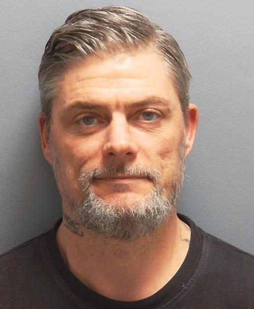 Mugshot of Benjamin Coates.