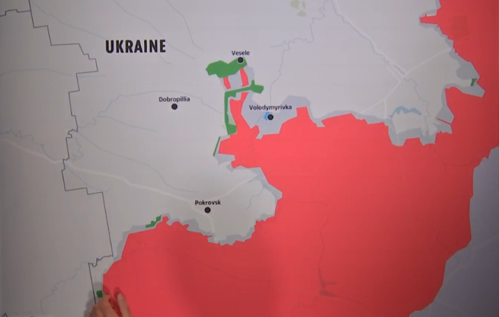 Illustration of a map of Ukraine with areas marked in red and green, and three towns labelled Dobropillia, Vesle, and Pokrovsk.