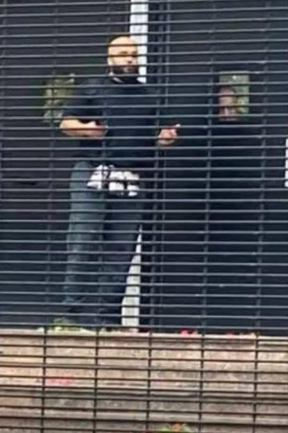 Knifeman Armed with Bomb Kills Two in 'Terror' Attack, Pictured Attempting to Enter Synagogue Before Police Shoot Him Down