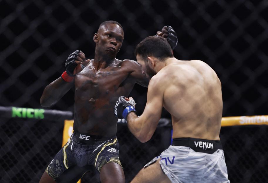 Israel Adesanya fighting Nassourdine Imavov in a UFC match.
