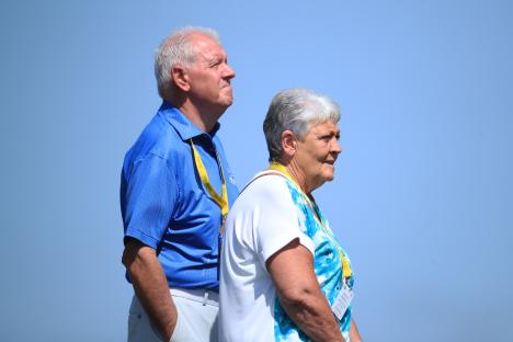 Rory McIlroy's parents watching a golf game.