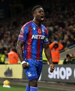 Crystal Palace's Marc Guehi celebrates scoring their side's second goal of the game during the Premier League match at Molineux, Wolverhampton. Picture date: Saturday November 2, 2024. PA Photo. See PA story SOCCER Wolves. Photo credit should read: Barrington Coombs/PA Wire. RESTRICTIONS: EDITORIAL USE ONLY No use with unauthorised audio, video, data, fixture lists, club/league logos or