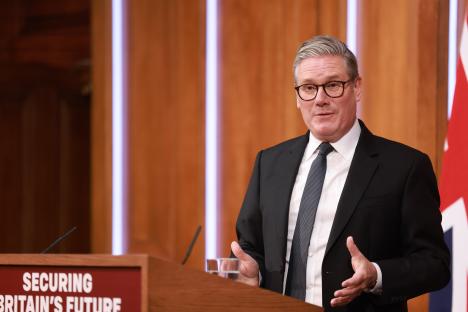 Keir Starmer giving a speech on securing Britain's future.