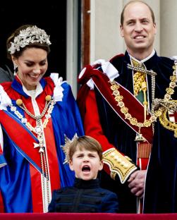 Prince William, Princess Catherine, and Prince Louis on the Buckingham Palace balcony.