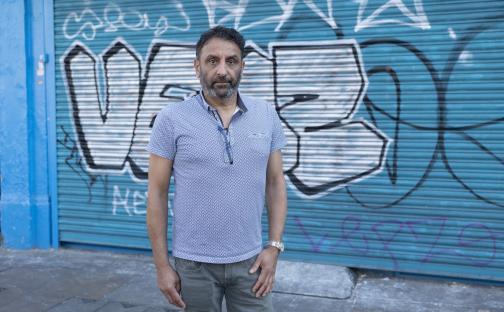 Nigel Singh posing for photos in Shepherd's Bush, London.