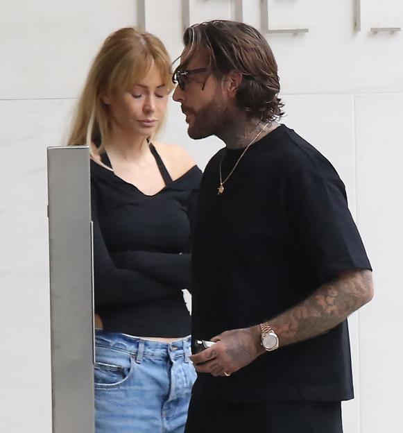 Pete Wicks and Olivia Attwood outside a recording studio.