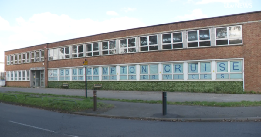 A brick building with "Southampton Cruise Parking Services" spelled out in letters across its windows.