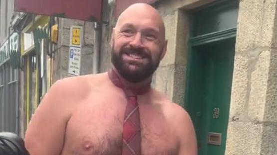 Tyson Fury spotted walking down high street with no top on wearing just a kilt as fans hail ‘people’s champion’