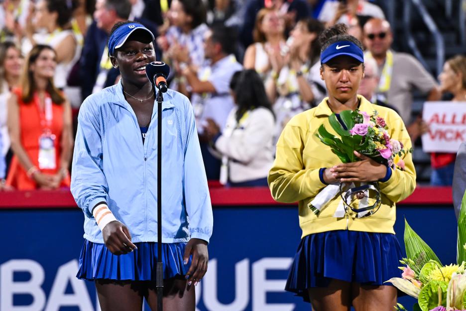 Victoria Mboko of Canada speaking at a tennis awards ceremony.