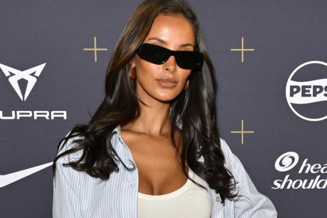 Watch as Maya Jama finally confirms Ruben Dias romance with kiss, cuddle and bite to neck at footy match