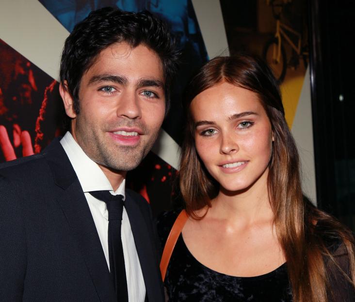 Actors Adrian Grenier and Isabel Lucas attending the premiere of "Teenage Paparazzo."