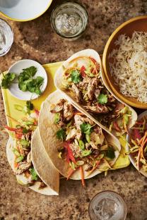 Chicken tacos with rice and slaw.