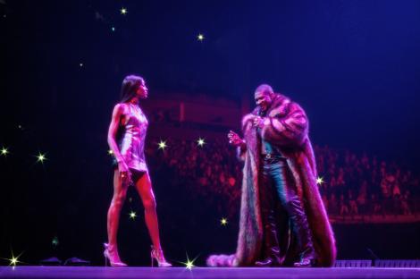 Usher and Naomi Campbell on stage.