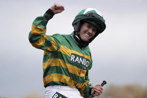 Rachael Blackmore celebrating a horse race win.