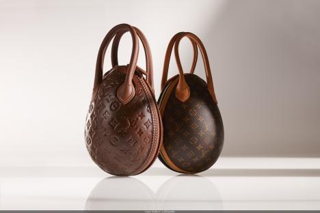 Two Louis Vuitton egg-shaped handbags.