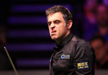 Ronnie O'Sullivan reacting during a snooker match.