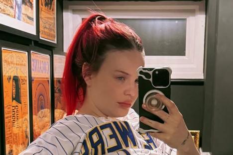 Pregnant Anne-Marie shows off her huge bare baby bump as she counts down to second birth