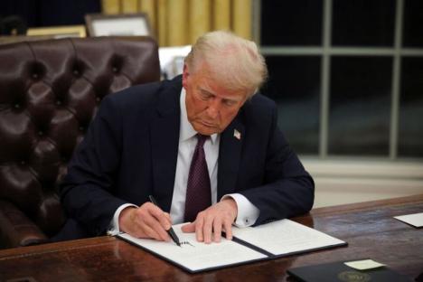 Trump signs order ending duty-free treatment for cheap shipments from China