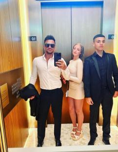 Peter Andres with his daughter and son in an elevator.