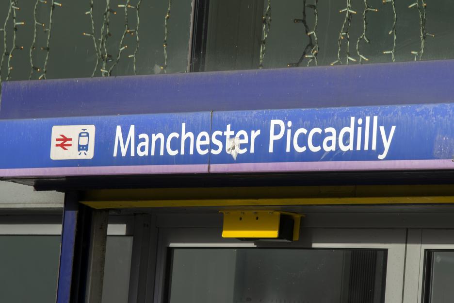A sign for Manchester Piccadilly train station.