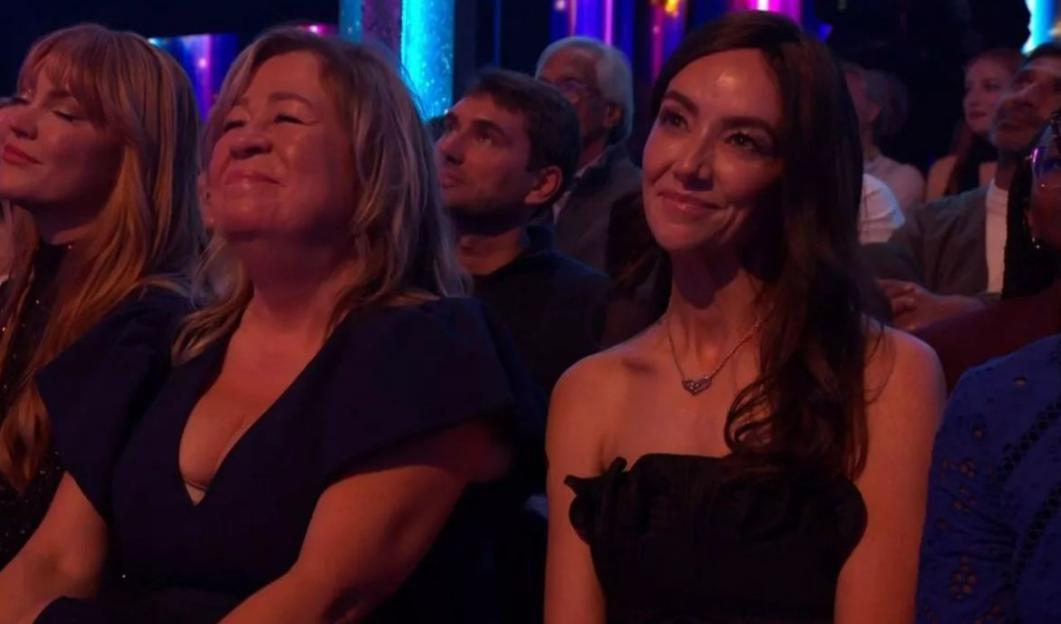 Bridget, Ross King's girlfriend, watching Strictly Come Dancing.