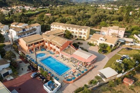 Aerial view of Luisa Hotel in Sidari, Corfu, showing the buildings, pool, and surrounding area.