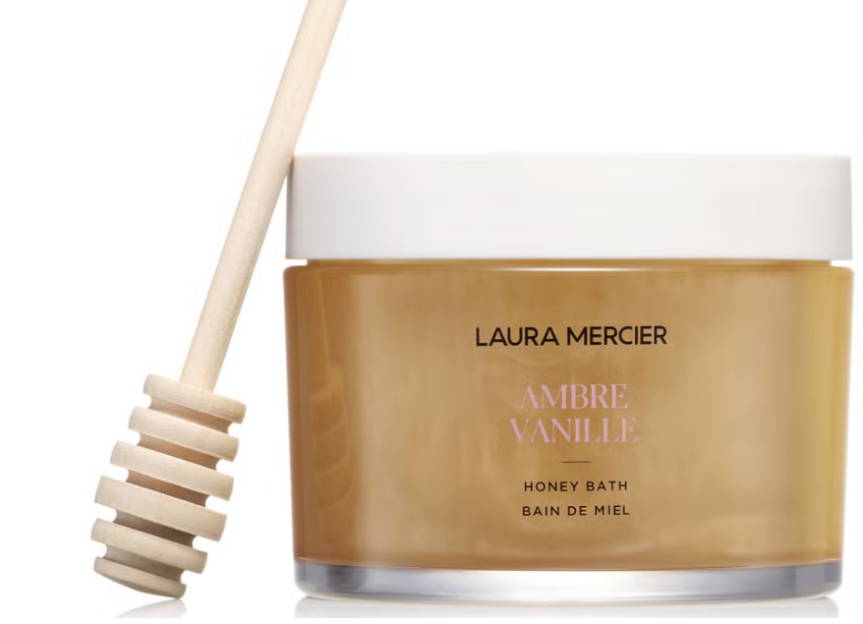 Laura Mercier Ambre Vanille Honey Bath with a honey dipper.