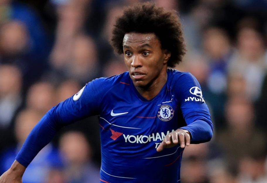 Willian of Chelsea dribbling the ball during a Premier League match.