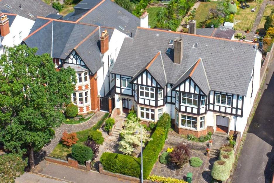Aerial view of Ruth Jones's mock Tudor house with a landscaped garden.