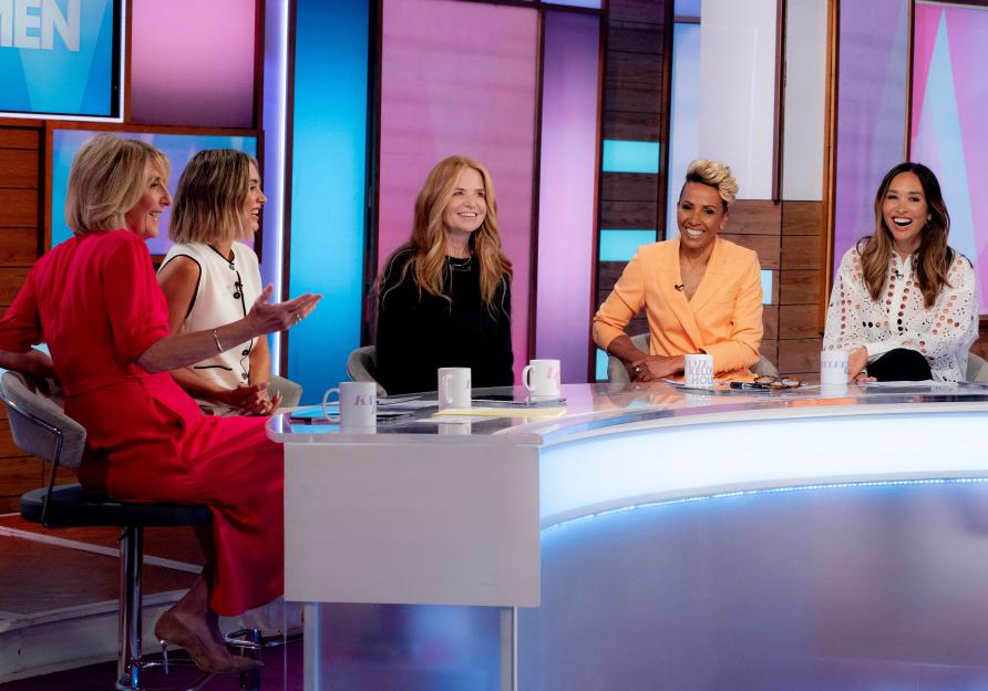 Five women sitting at a table on the Loose Women TV show.
