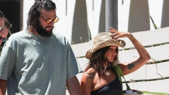 Andy Carroll and Lou Teasdale look loved up as pair walk hand-in-hand in Ibiza with pals saying he plans to propose
