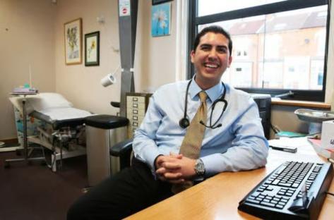 Photo of Dr. Zak Uddin in his office.